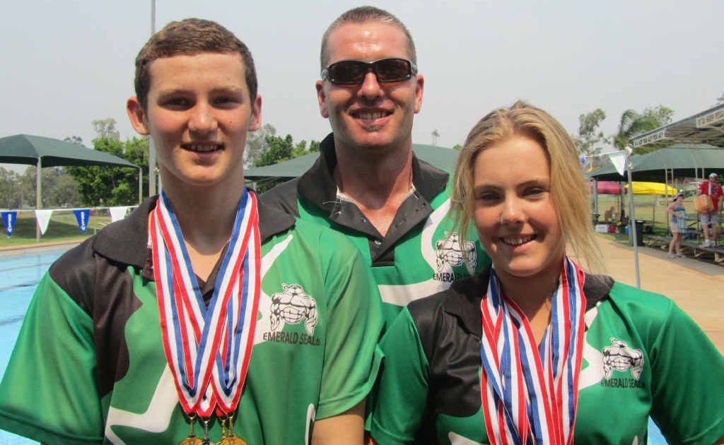 Seals’ new coach, Shaun Leo with club captains Lachlan Sands and Tory Edmistone after a successful swim meet in Clermont earlier this month. Seals’ new coach, Shaun Leo with club captains Lachlan Sands and Tory Edmistone after a successful swim meet in Clermont earlier this month.